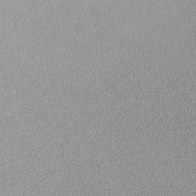 Gros plan de la texture d’une dalle de garage en PVC gris clair
