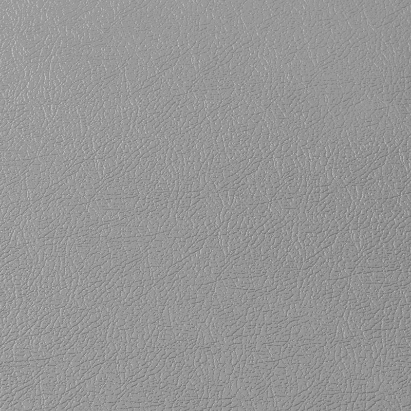 Gros plan de la texture d’une dalle de garage en PVC gris clair