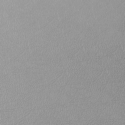 Gros plan de la texture d’une dalle de garage en PVC gris clair